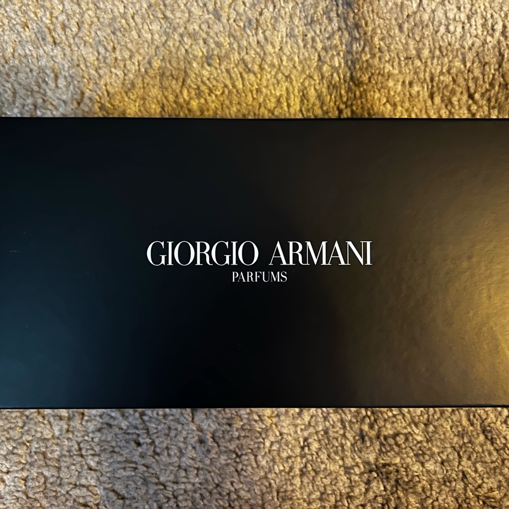 Giorgio Armani Parfums black satin clutch bag
New with tags